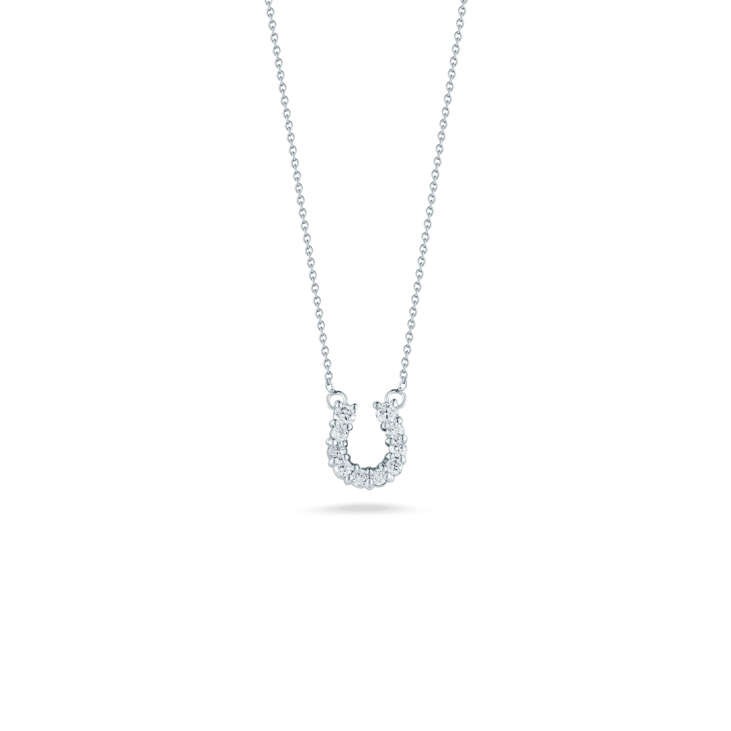 Horseshoe pendant featuring pave-set diamonds totaling .23ct on an ...