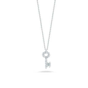 A mini key pendant with diamonds totaling .16ct on an 18