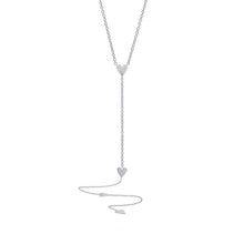 This lariat necklace features round brilliant cut diamonds that tot...
