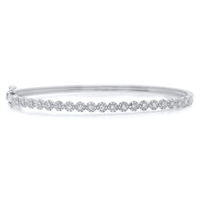 This bangle features .89cts of round brilliant cut diamonds.