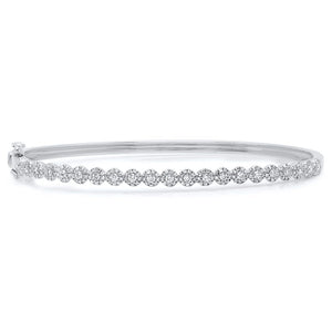 This bracelet features round brilliant cut diamonds that total .89cts.