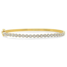 This bangle features .89cts of round brilliant cut diamonds.