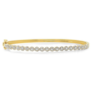 This bracelet features round brilliant cut diamonds that total .89cts.