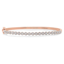 This bangle features .89cts of round brilliant cut diamonds.