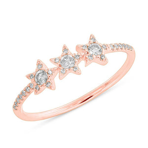 This star ring features round brilliant cut diamonds that total .20...