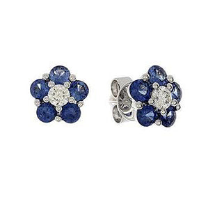 These earrings feature round brilliant cut diamonds that total .26c...