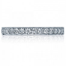 This beautiful ring has diamonds half way around or eternity with a...