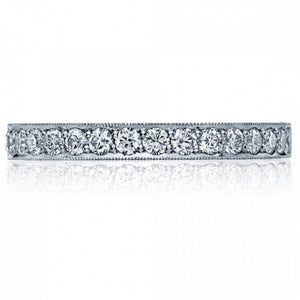 This beautiful ring has diamonds half way around or eternity with a...