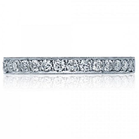 This beautiful ring has diamonds half way around or eternity with a...