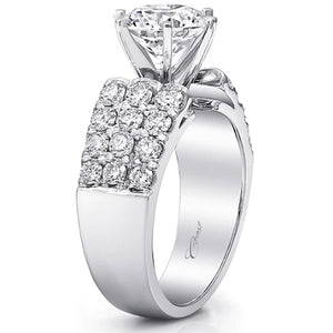 A statement of grandeur, this engagement ring features 3 rows of ro...