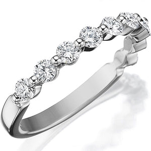 This classic style by Henri Daussi features a single row of round b...