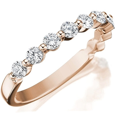 This classic style by Henri Daussi features a single row of round b...