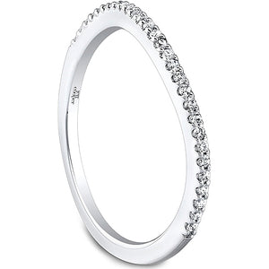 This diamond wedding band by Jeff Cooper features round brilliant c...
