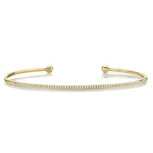 This cuff bracelet features pave set round brilliant cut diamonds w...