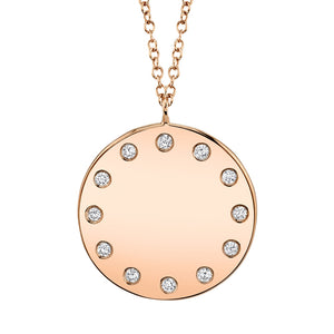 This necklace features round brilliant cut diamonds that total .09c...