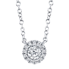 This diamond necklace features round brilliant cut diamonds that to...