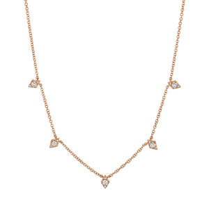 This necklace features round brilliant cut diamonds that total .19cts.