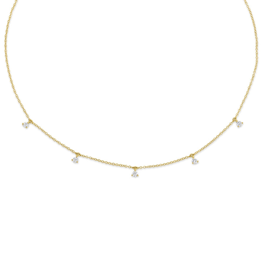 This necklace features round brilliant cut diamond drops that total...