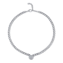 This diamond necklace features cuban links with a pave heart that t...