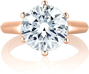 Crafted to ensure that all eyes rest upon the center diamond, the C...