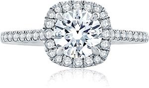 This engagement ring features a round center stone with cushion sha...
