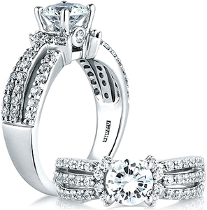 This diamond engagement ring setting features three rows of pave se...