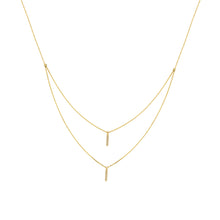 This necklace features two stick drops with round brilliant cut dia...