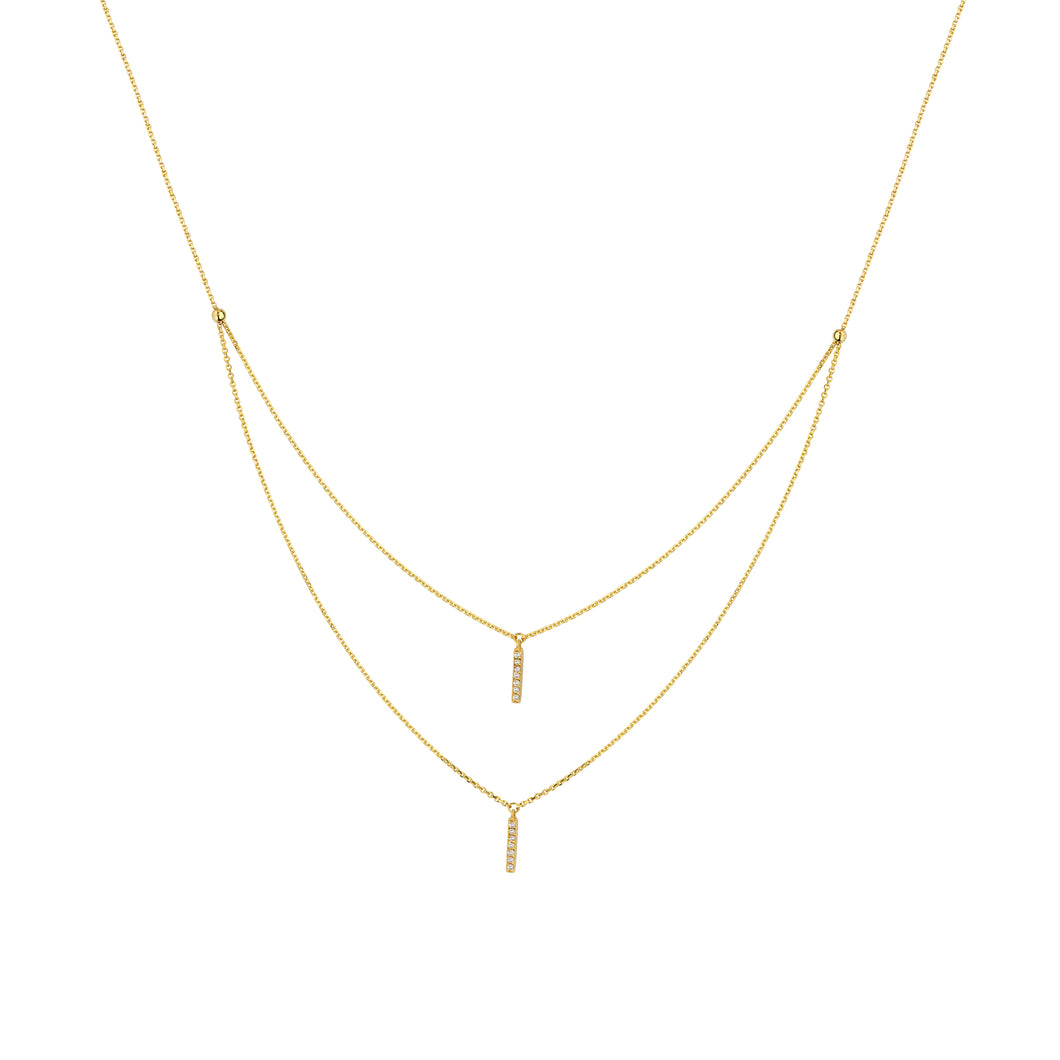 This necklace features two stick drops with round brilliant cut dia...