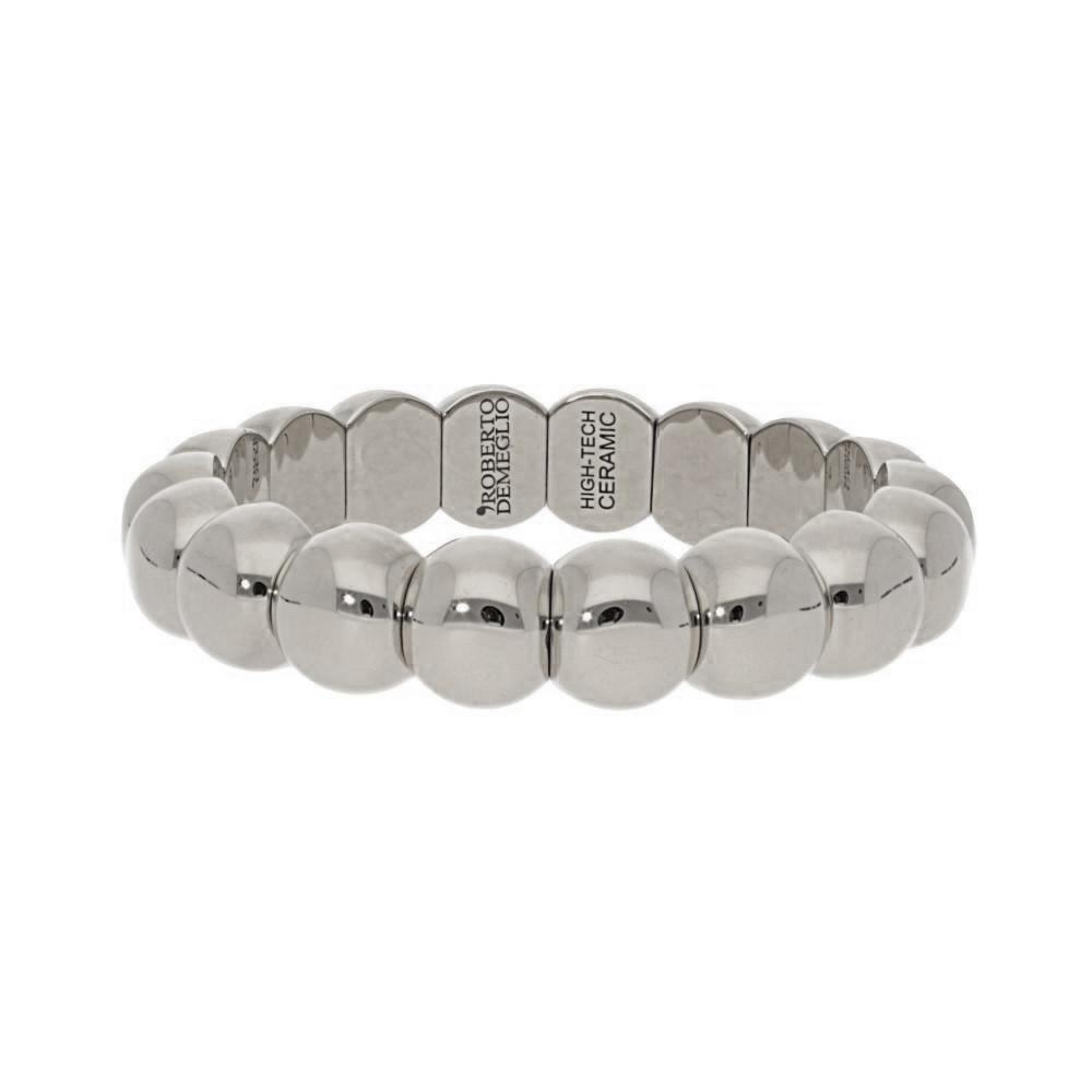 This bracelet features ceramic beads with an 18k white gold finish ...