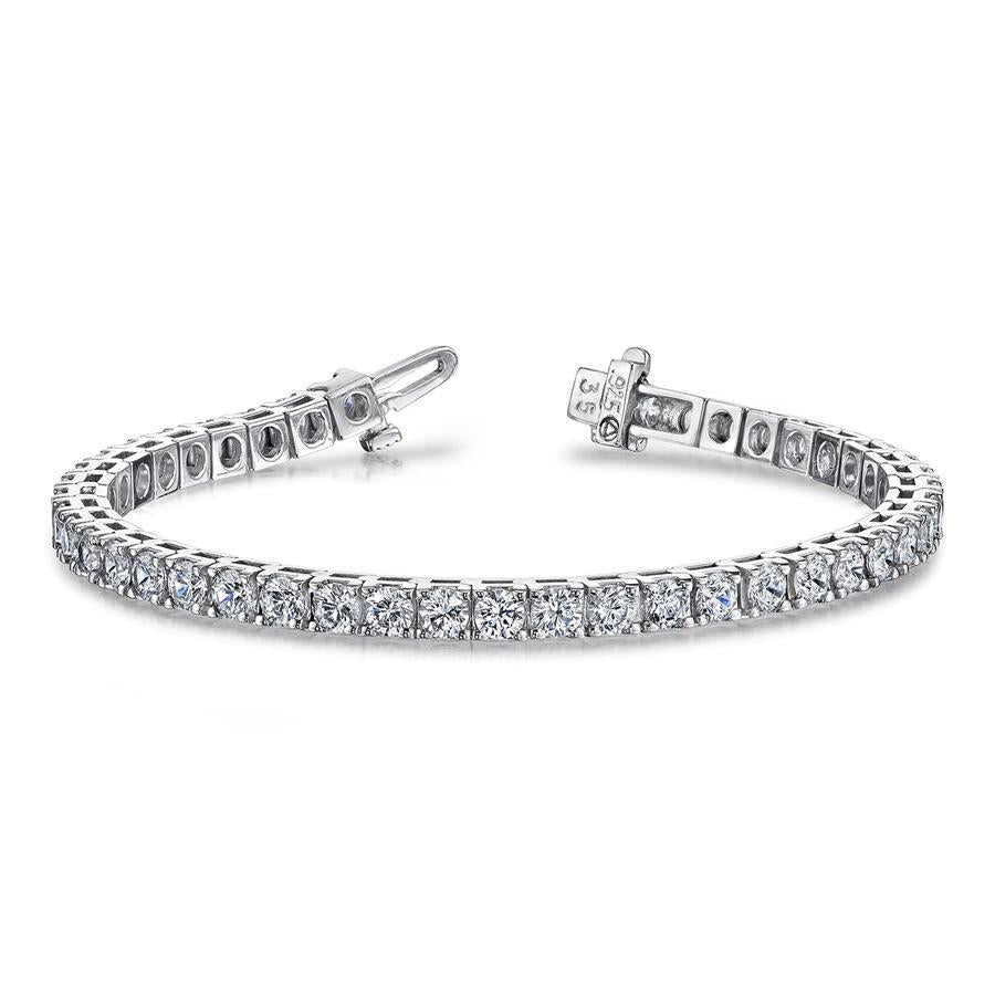 This diamond tennis bracelet features round brilliant cut diamonds ...