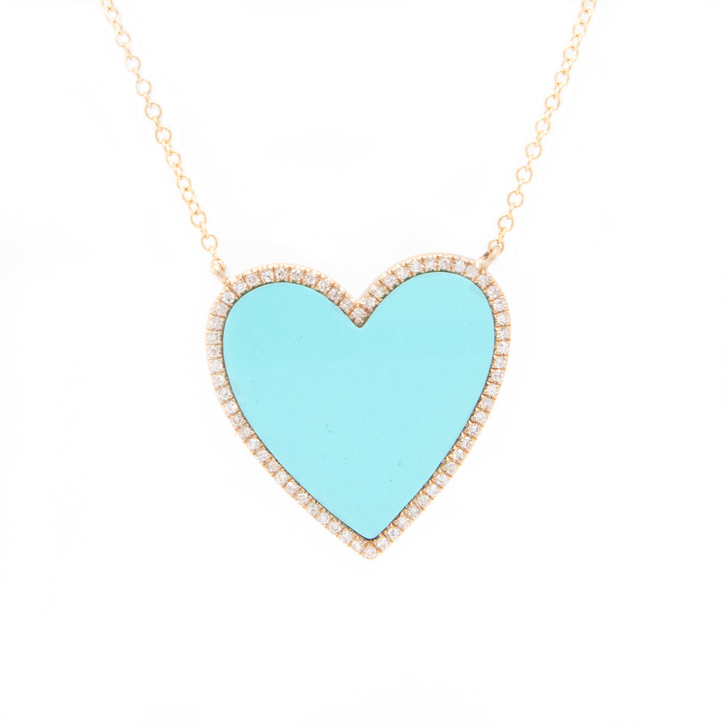 This colorful 14k yellow gold statement necklace features a turquoi...