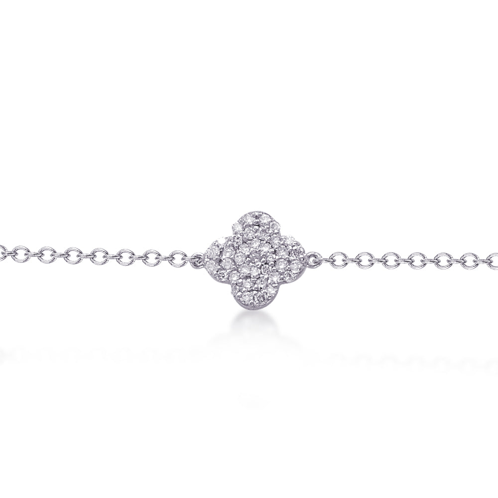 This diamond bracelet features pave set round brilliant cut diamond...