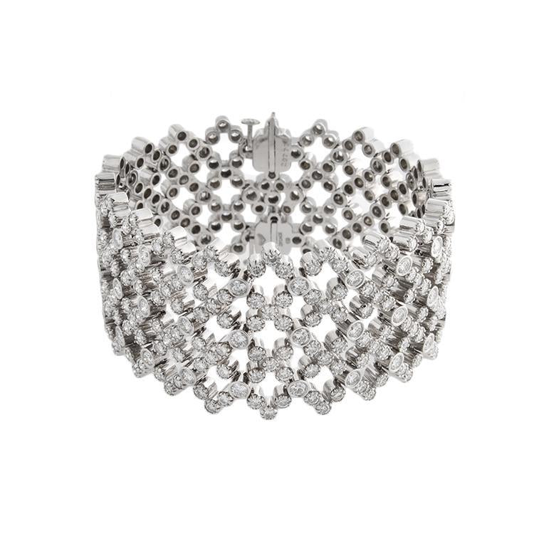 This diamond bracelet features round brilliant cut diamonds that to...