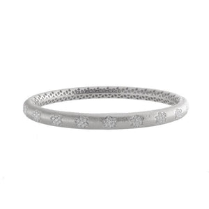 This bangle features a cluster of round brilliant cut diamonds that...