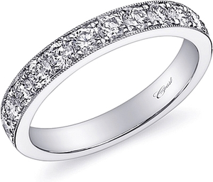 A sparkling statement, this wedding band features fine pave set dia...
