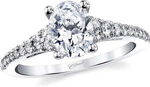 A stunning engagement ring delicately adorned with fishtail set dia...