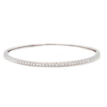 This classic bangle features 41 beautiful, pave-set diamonds half w...