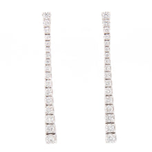 elegant dangle earrings featuring 34 round brilliant cut diamonds t...