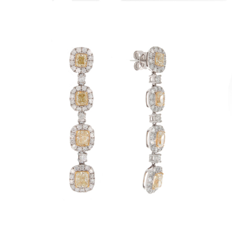 These diamond drop earrings feature eight cushion cut yellow diamon...