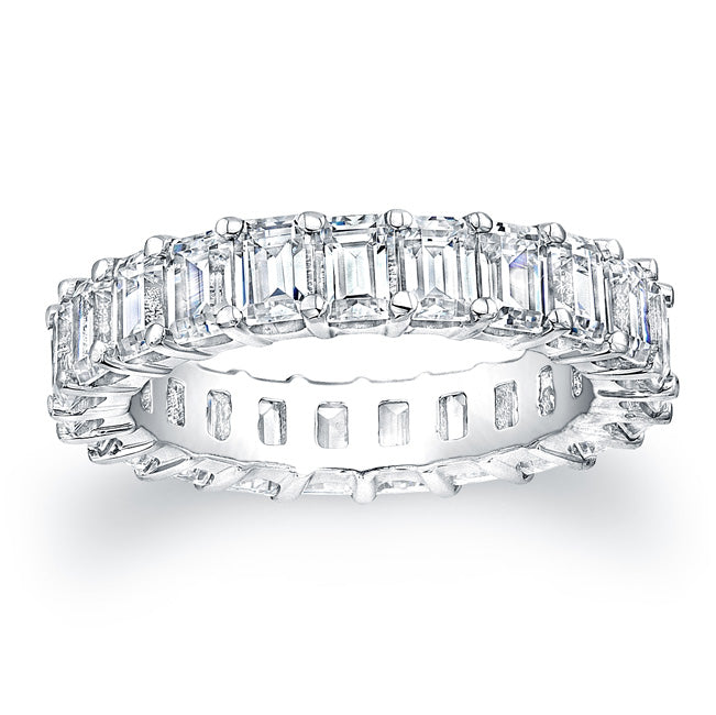 
Emerald cut diamonds are set in a continuous circle using shared p...