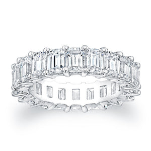 
Emerald cut diamonds are set in a continuous circle using shared p...