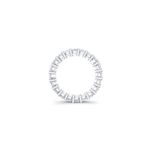 
Emerald cut diamonds are set in a continuous circle using shared p...