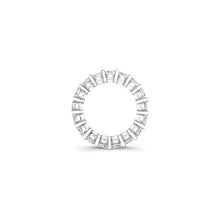 
Princess cut diamonds are set in a continuous circle using shared ...