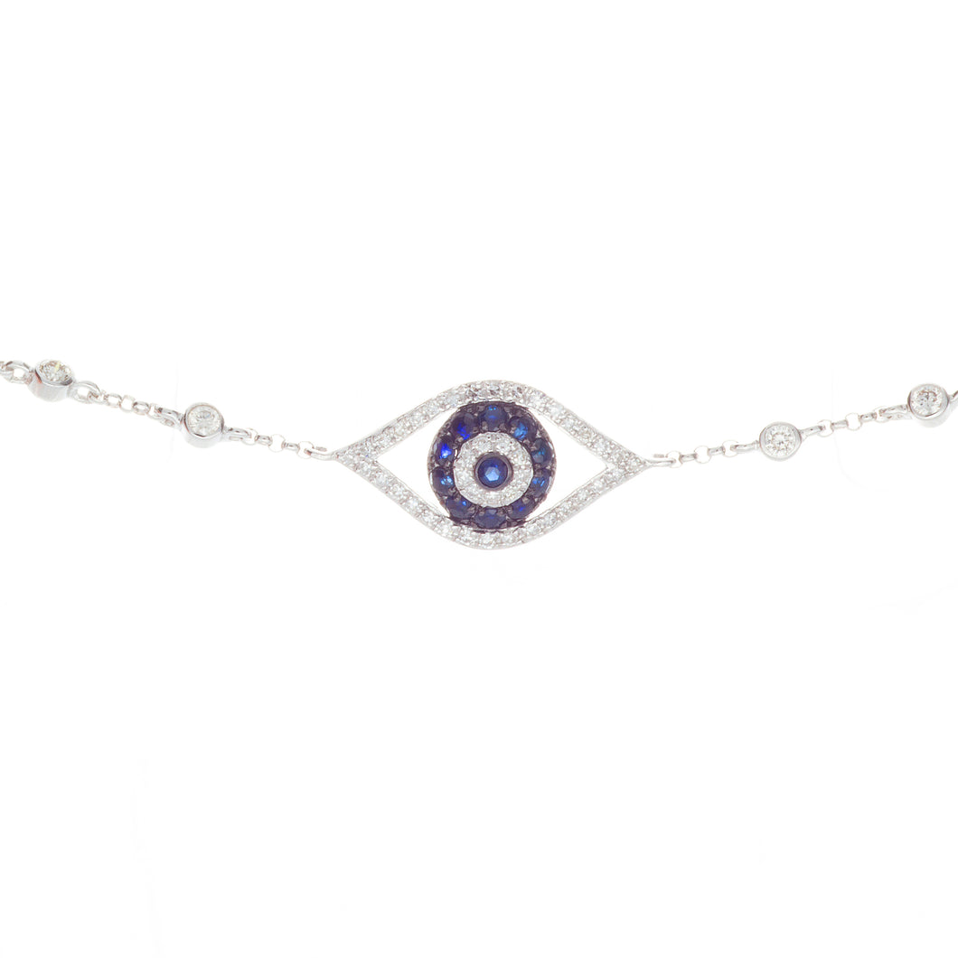 this evil eye bracelet features sapphires totaling .25ct and diamon...