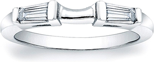 This fitted wedding band features two tapered baguette diamonds and...