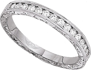 This vintage style wedding band by Martin Flyer features round bril...