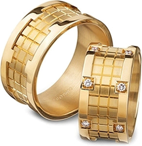 This wedding band by Furrer Jacot features a unique checkerboard de...