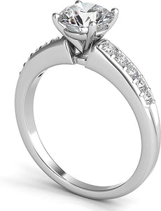 A classic graduated diamond ring featuring a single row of round br...