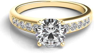 A classic graduated diamond ring featuring a single row of round br...