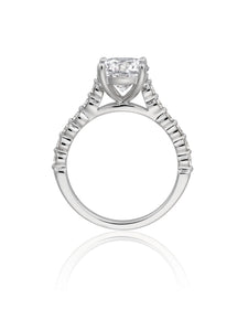 This diamond engagement ring features prong set round brilliant cut...